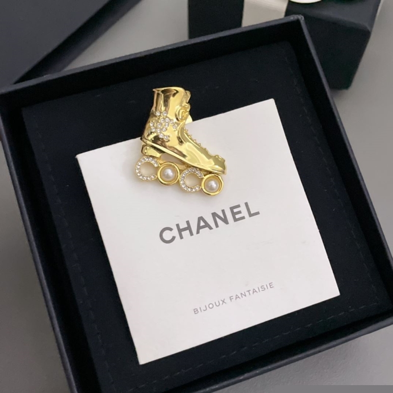 Ch*el brooches